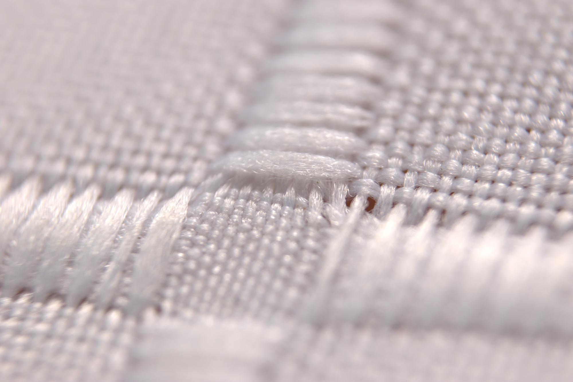 Stichdetail auf Baumwolle